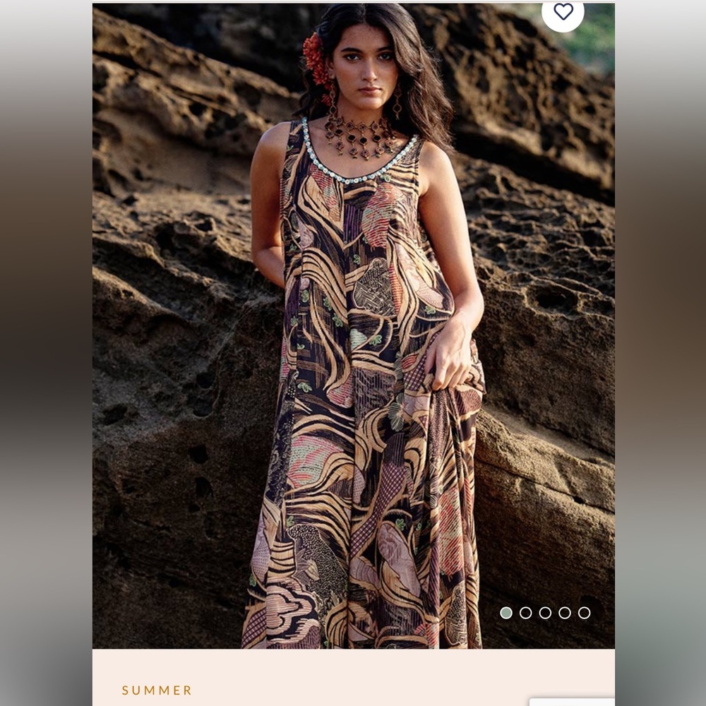 Beautiful bohemian jumpsuit. Never worn. Looks very classy.